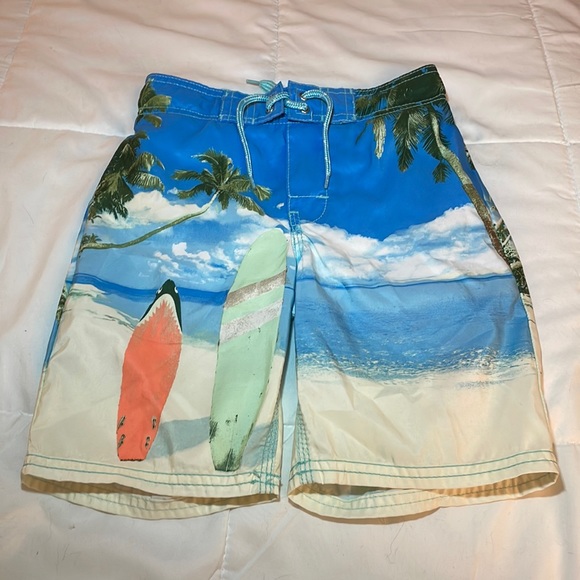 OshKosh boy’s swim trunks. Size 6. Island/surfboard print. - Picture 1 of 4